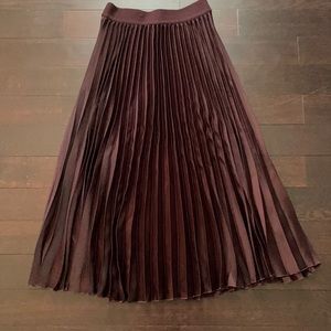 H&M’s pleated plum skirt